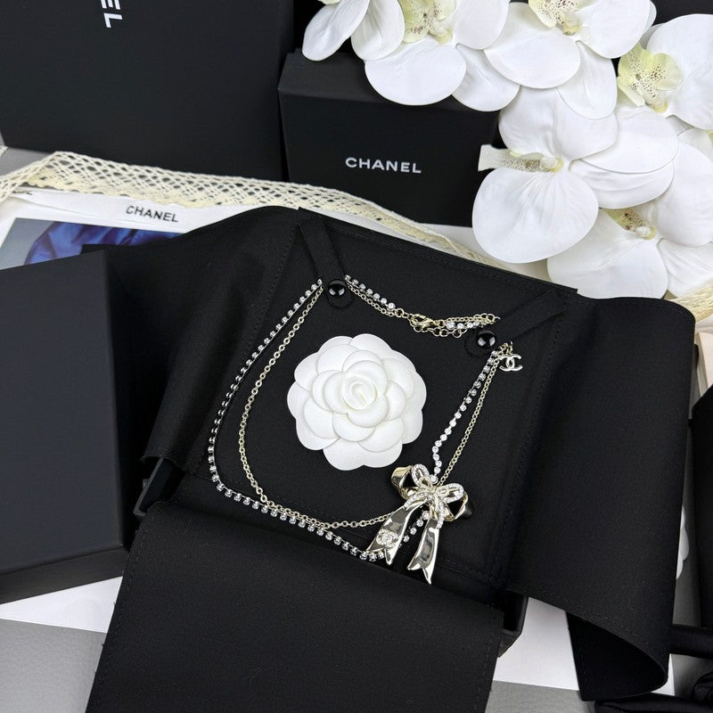 18K  Chanel 25K Bow Tie Diamond Gold Necklace